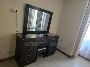 King-Size Bed With Mattress, 2 Nightstands, Dresser, and 3 Rugs.