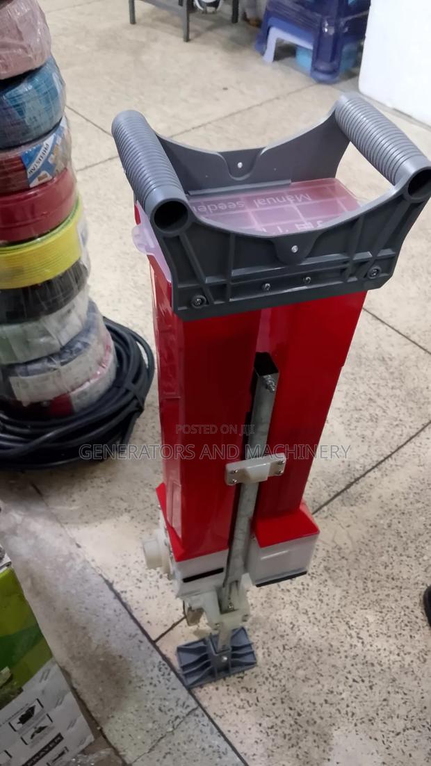 Seed Planter.Red