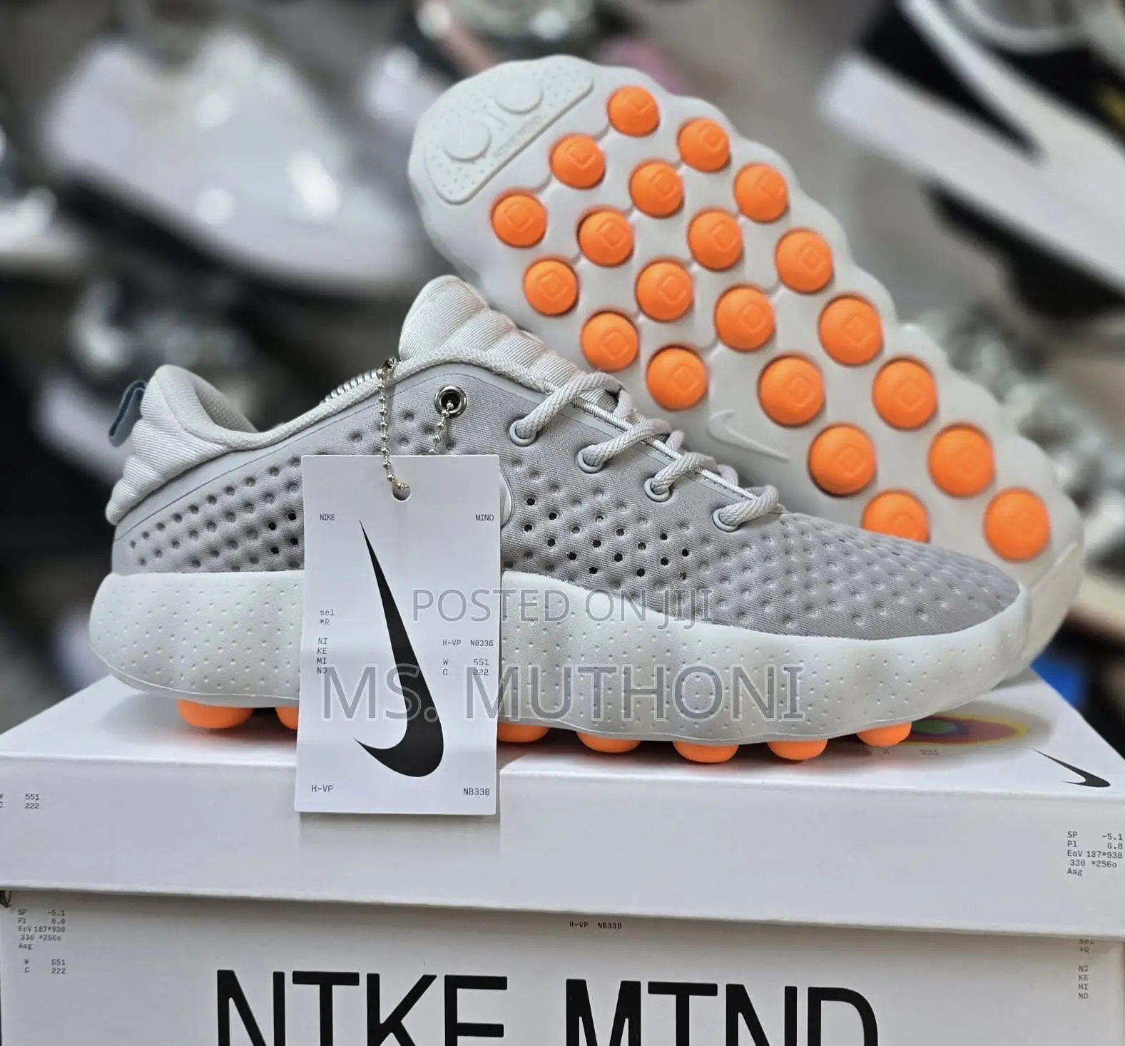 Nike Mind 002 Pregame Shoes in a Light Smoke Grey