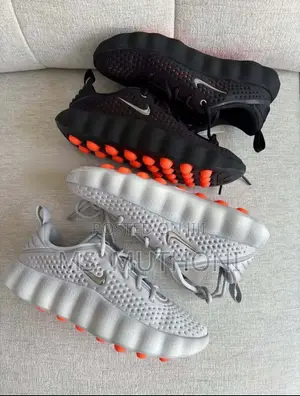 Nike Mind 002 Pregame Shoes in a Light Smoke Grey