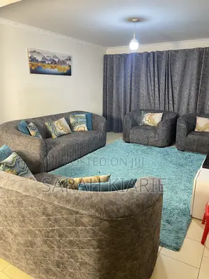 7 Seater Grey Curved Couch
