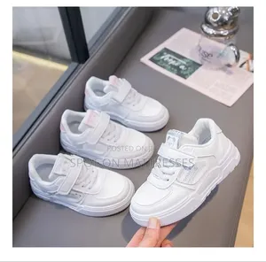 Kids' White Sneakers. Sizes 27-36. Delivery Services Available.