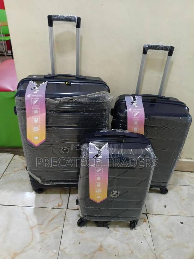 3in1 Rubber Suitcase Set With Spinner Wheels - thumbnail 2