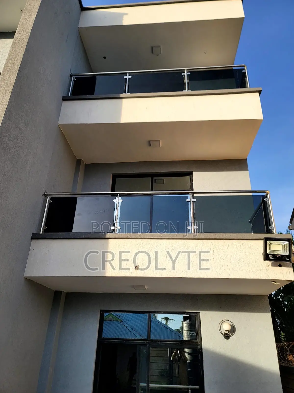 Tinted Glass Balcony Balustrades – Multi-Level Installation