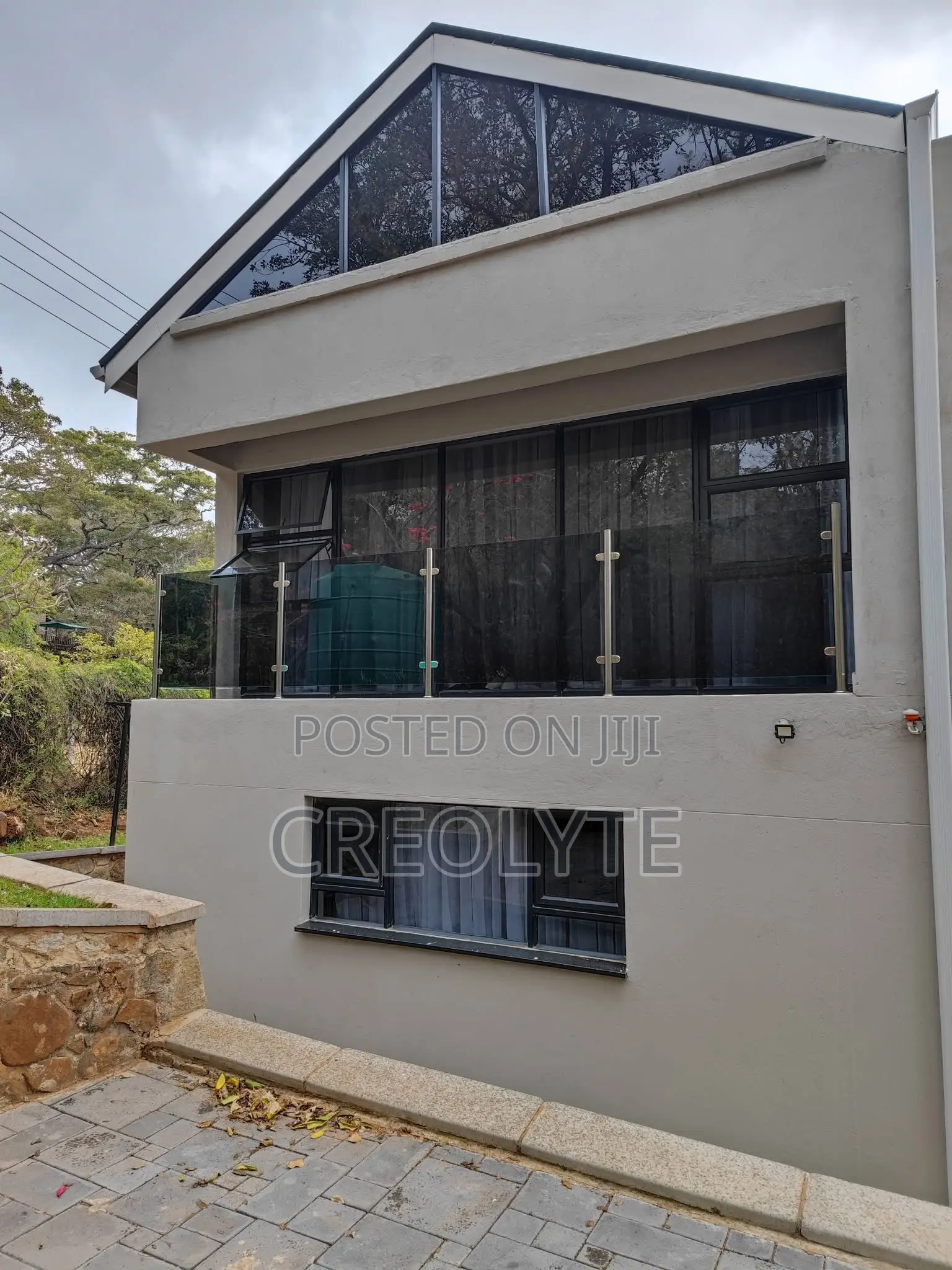Tinted Glass Balcony Balustrades – Multi-Level Installation