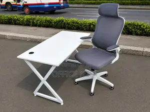 Metallic White Office Table With White Ergonomic Office Chair