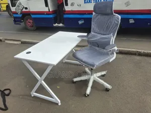 Metallic White Office Table With White Ergonomic Office Chair