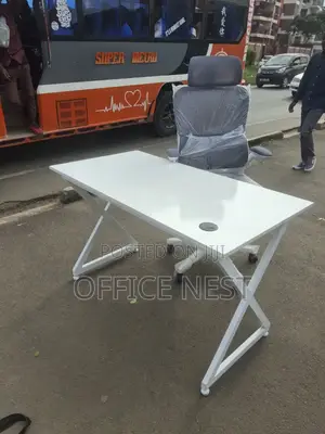 Metallic White Office Table With White Ergonomic Office Chair