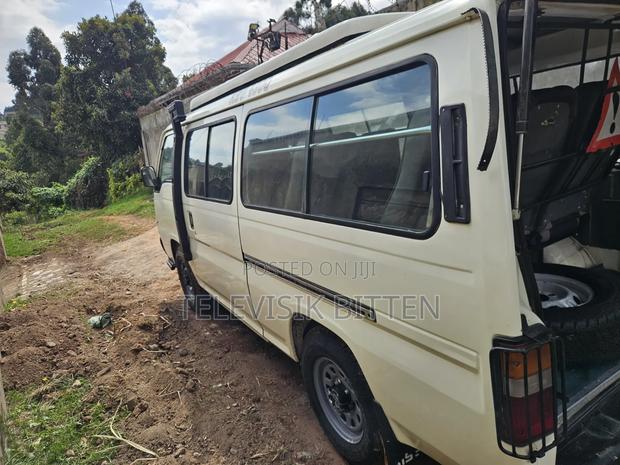 Nissan Caravan (Urvan) 2013 White - thumbnail 10
