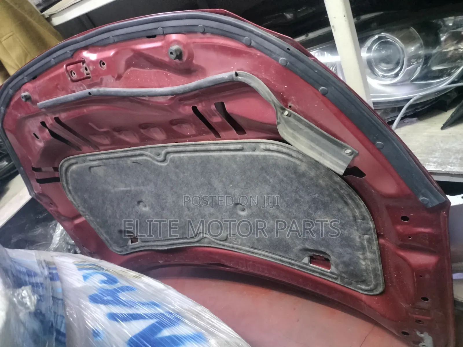 Wine Red Demio 2016 Bonnet