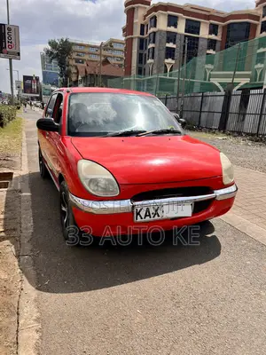 Toyota Duet 1999 Red