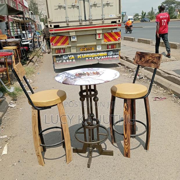 Balls High Table With Polished Wood Chairs