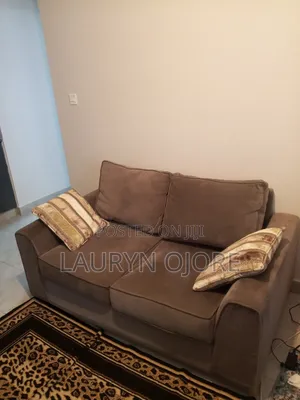 2-Seater Fabric Sofa - Good Condition