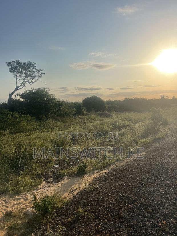Quarter an Acre at Touching Tarmac Road.