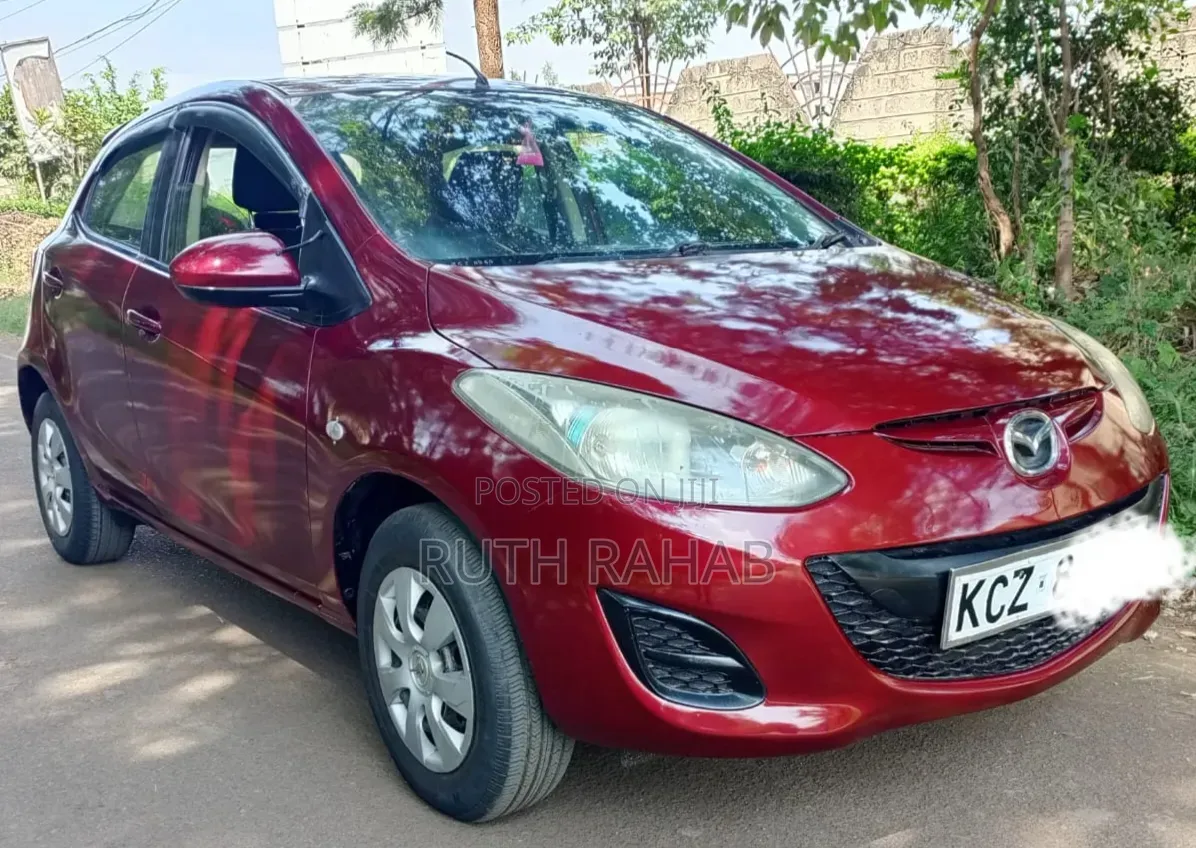 Mazda Demio 2010 Maroon