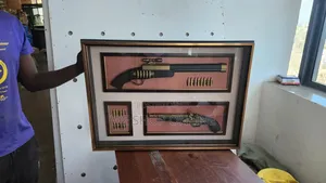 2 16 Bullets Wall Decor. Size: 58*80 Cm