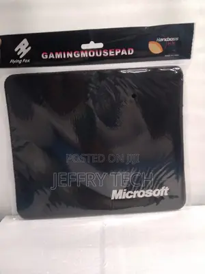 Mousepad With a "Microsoft" Logo on a Black Surface.