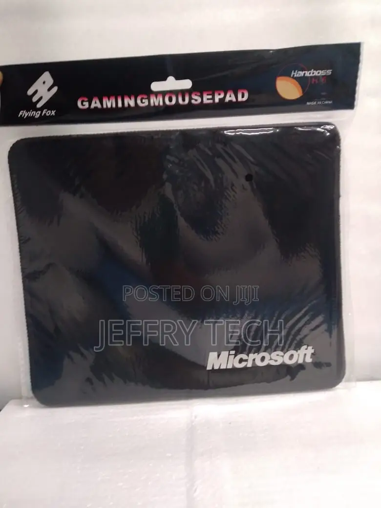 Mousepad With a "Microsoft" Logo on a Black Surface.
