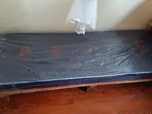 2.5 by 6 Bed and Mattress.