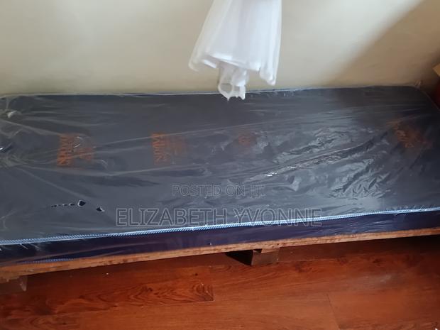 2.5 by 6 Frame Bed and Mattress. - thumbnail 2