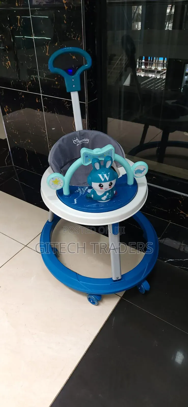 Baby Walker With Toys and a Push Handle