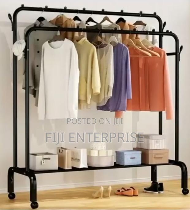 Double Pole Clothing Rack With Wheels Lower Storage Shelf