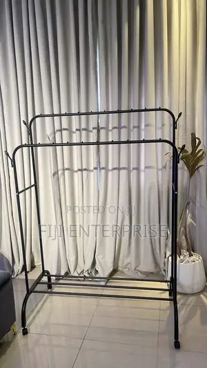 Double Pole Clothing Rack With Wheels Lower Storage Shelf