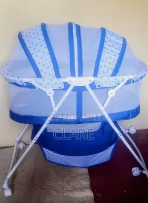 Bassinet Blue And White, Retractable Wheels, Overhead Net.