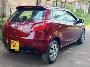 Mazda Demio 2013 Maroon