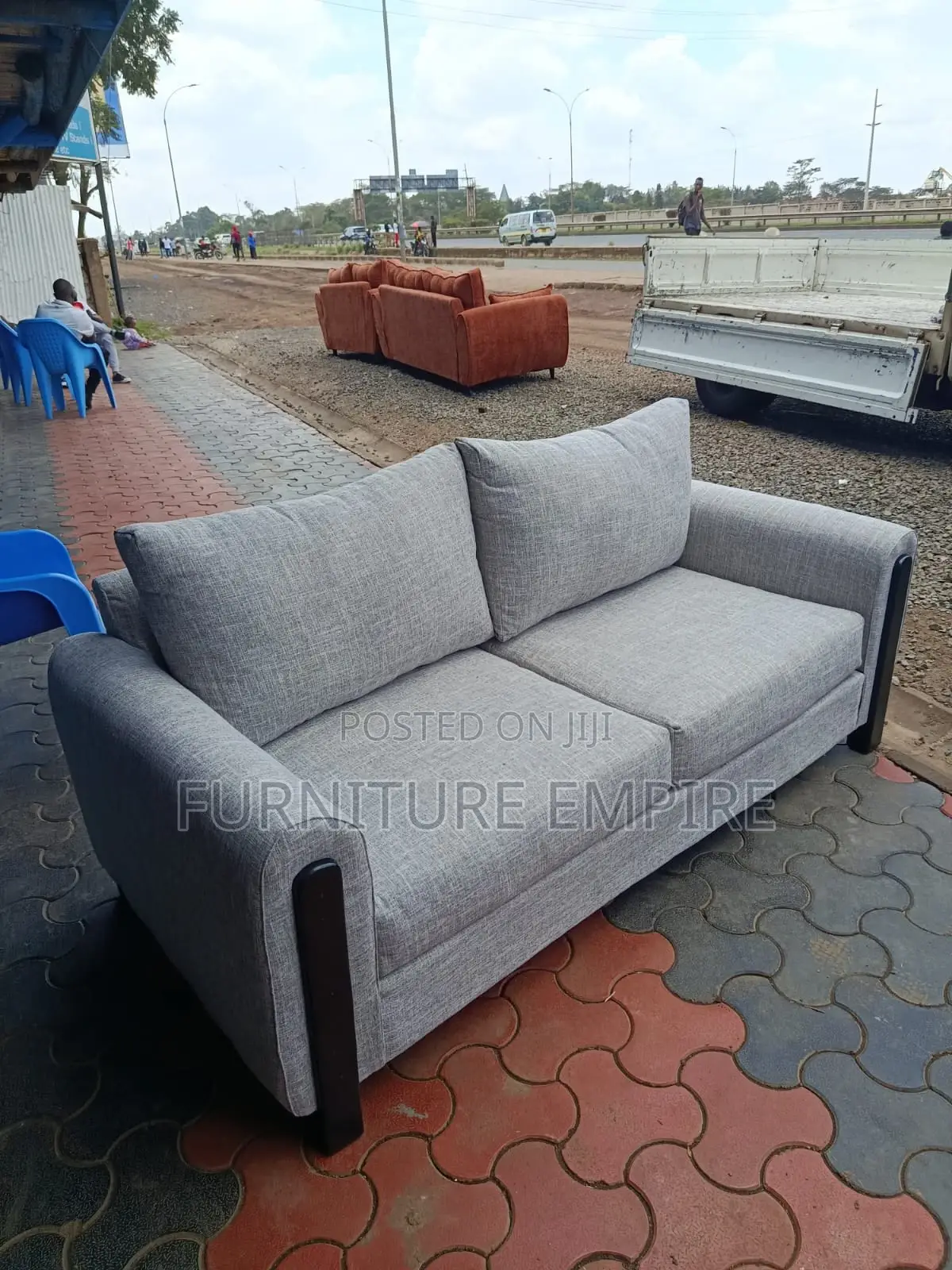 3 Seater Grey Sofa With Wooden Armrest Accents