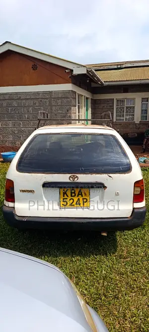 Toyota Corolla Hatchback 1999 White