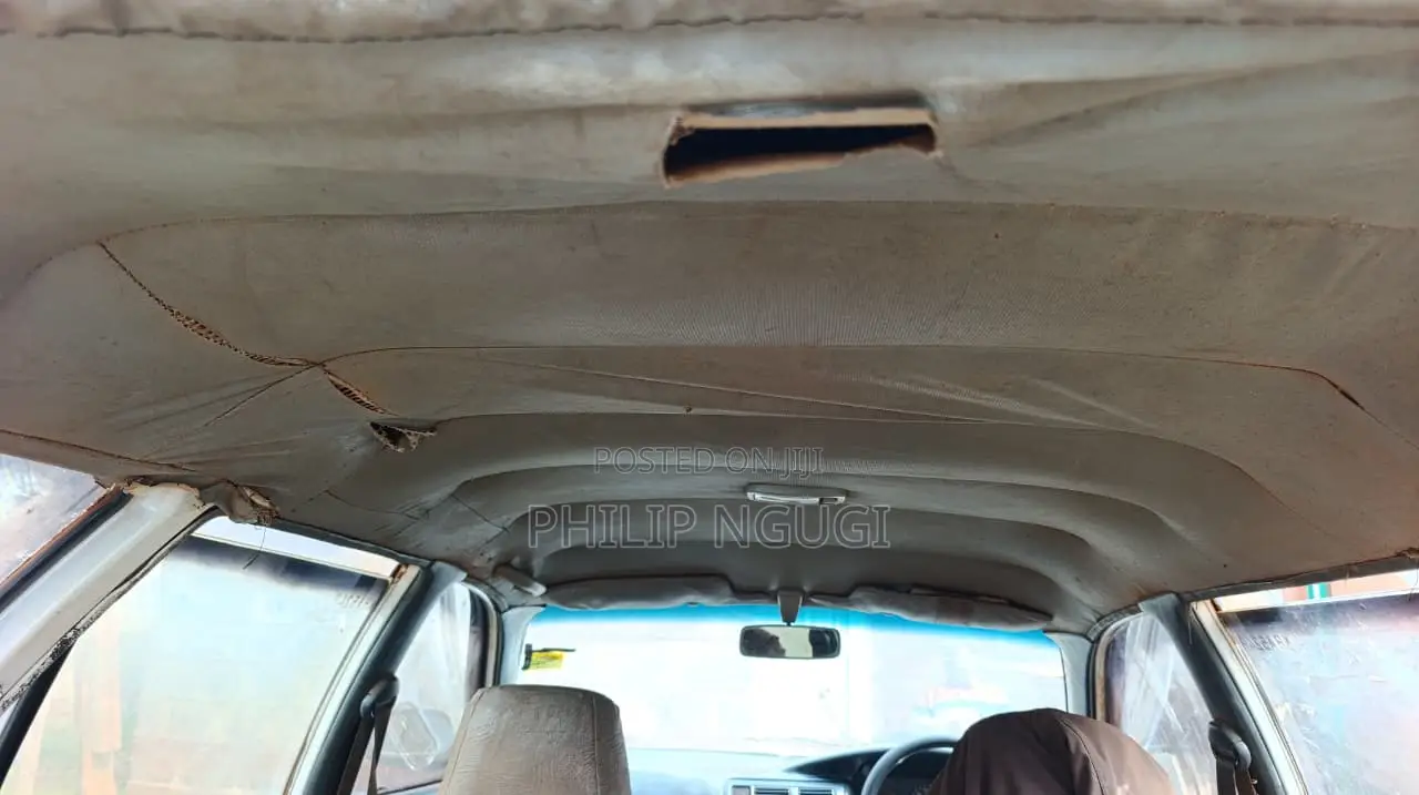 Toyota Corolla Hatchback 1999 White