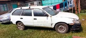 Toyota Corolla Hatchback 1999 White