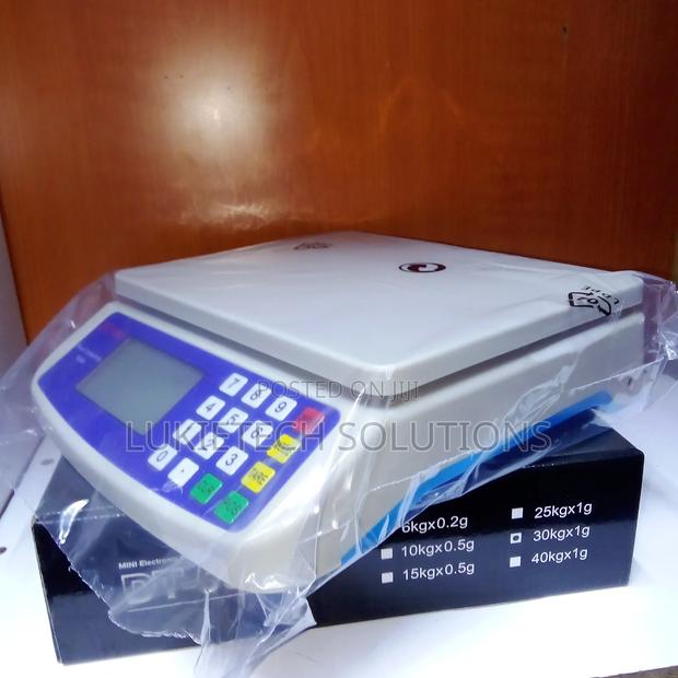 Price Computing Electric Scale, Powered by Batteries and Electricity