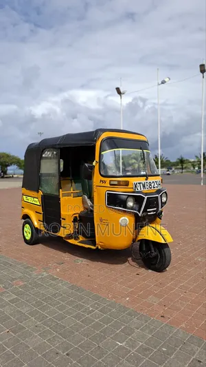 Bajaj RE 2022 Yellow