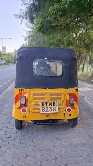 Bajaj RE 2022 Yellow