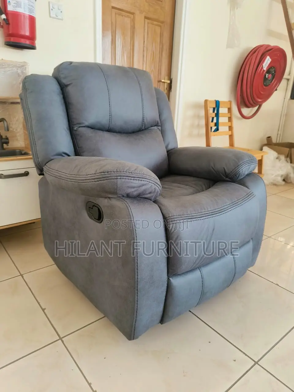 Grey One-Seater Recliner Sofa.