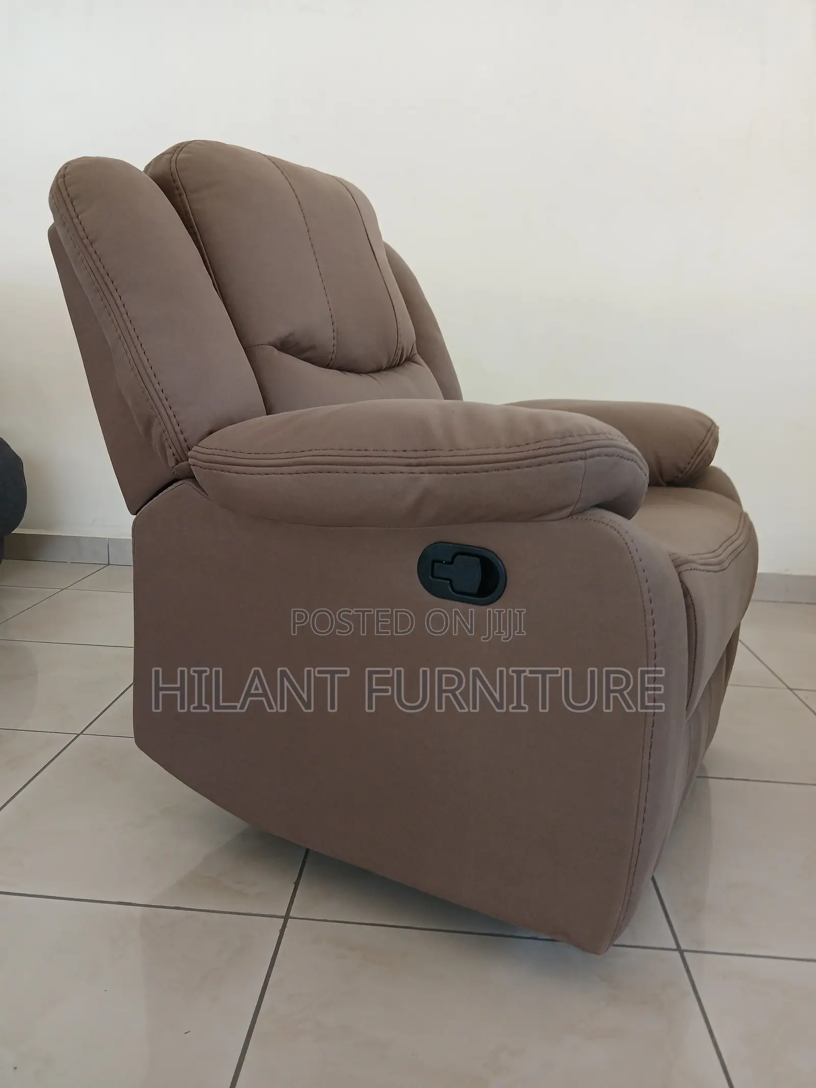 Brown One-Seater Recliner Sofa.
