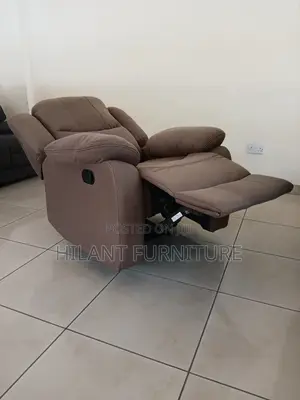 Brown One-Seater Recliner Sofa.