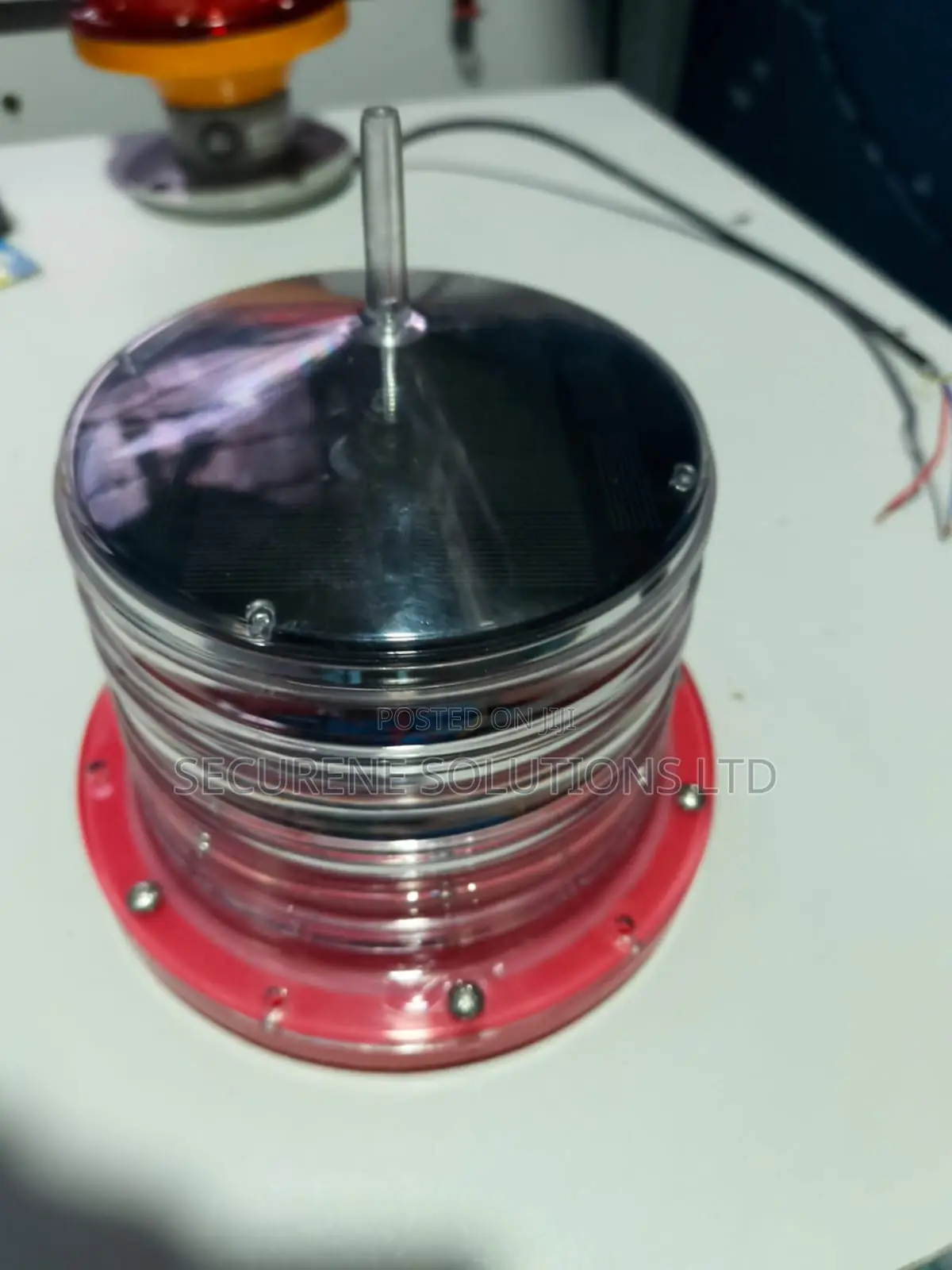 Red Solar-Powered Marine Navigation Beacon