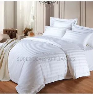 A Pair of a Duvet Cover With a Bedsheet and Two Pillow Cases