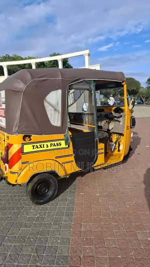 Bajaj RE 2023 Yellow