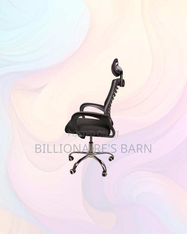 Practical Secretarial Mesh Chair With Headrest for Compact Work Areas