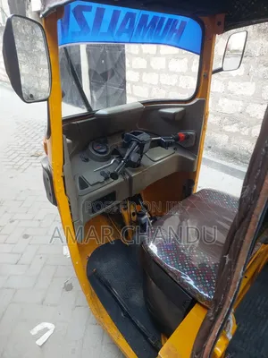 Bajaj RE 2021 Yellow