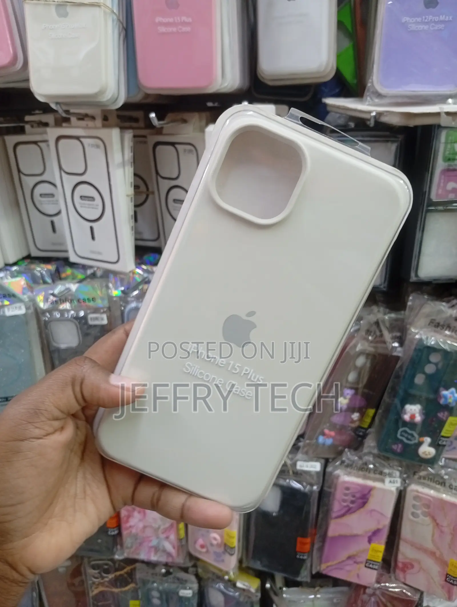 iPhone 15 Plus Silicone Case in a Sleek White or Light Cream Finish