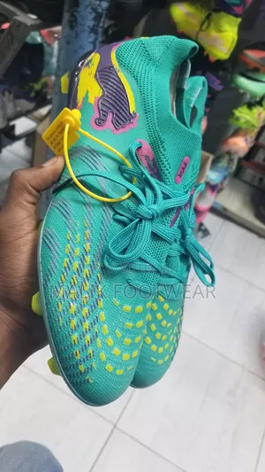Puma Future Ultimate Fg/Ag Football Boots – Emerald Green/Purple