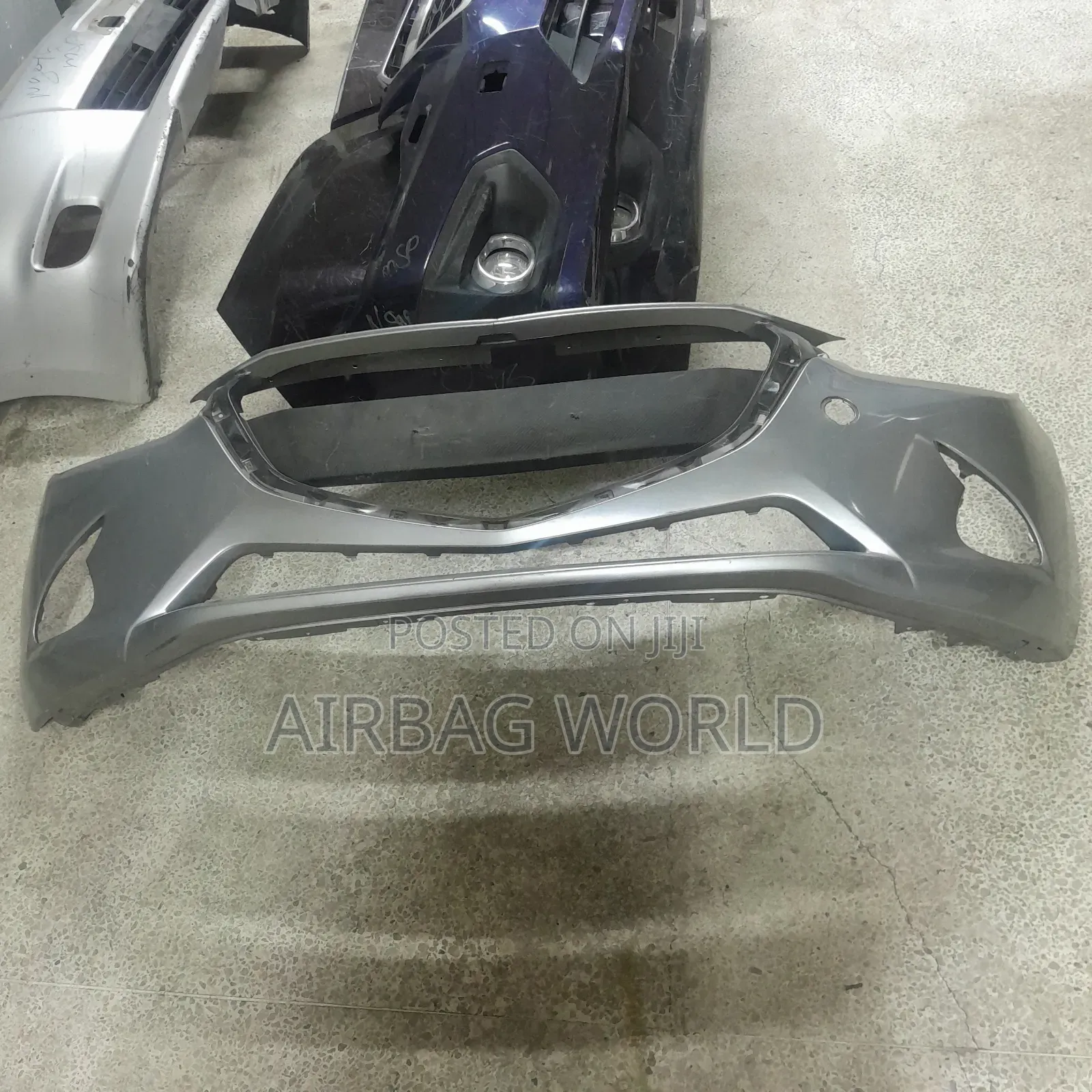 Mazda Demio Front Bumper Shell