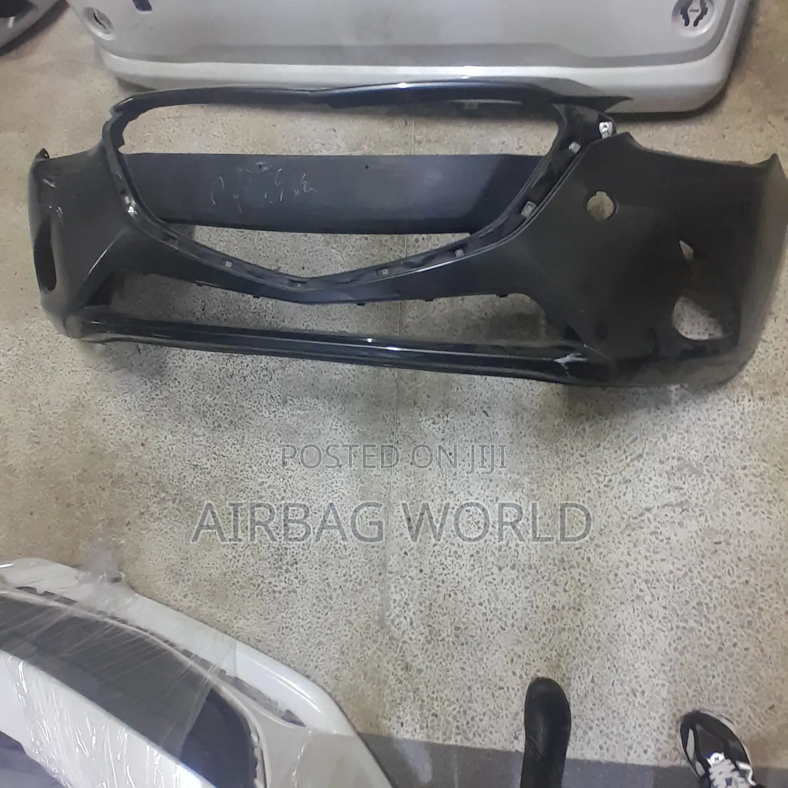 Mazda Demio Front Bumper Shell