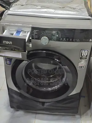 A Mika Washing Machine 8kg Wash and Spin Used for 4 Months