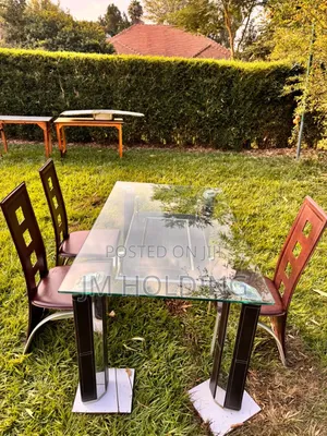 Elegant Glass Top Dining Table With 3 Leather Chairs